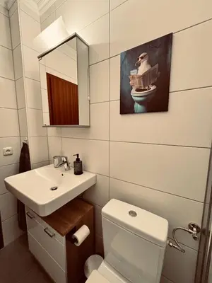 Ein Badezimmer in der Unterkunft Apartment 1 - Haus Heinke am Deich
