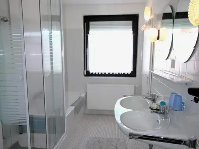Ein Badezimmer in der Unterkunft Haus Vogelsand