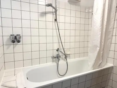 Ein Badezimmer in der Unterkunft Apartmenthaus Frauenpreiss FeWo 54