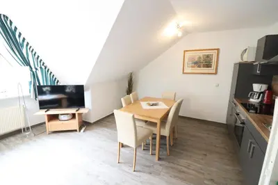 TV/Unterhaltungsangebot in der Unterkunft Itjen am Strand Wohnung 1 Grün