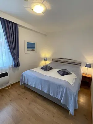Ein Bett oder Betten in einem Zimmer der Unterkunft 
