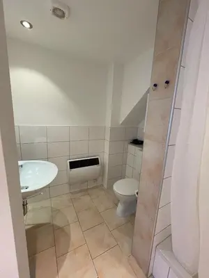 Ein Badezimmer in der Unterkunft 