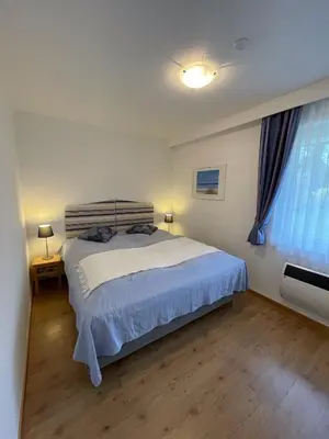 Ein Bett oder Betten in einem Zimmer der Unterkunft 