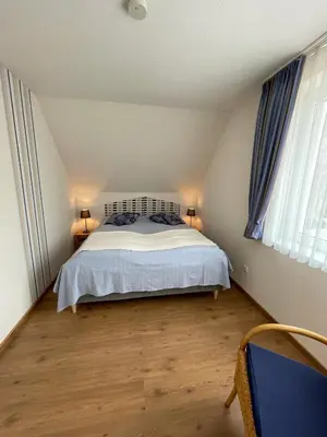 Ein Bett oder Betten in einem Zimmer der Unterkunft 