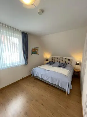 Ein Bett oder Betten in einem Zimmer der Unterkunft 