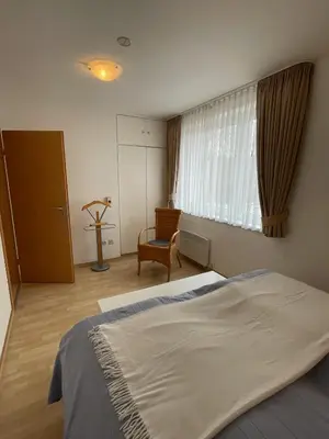 Ein Bett oder Betten in einem Zimmer der Unterkunft 