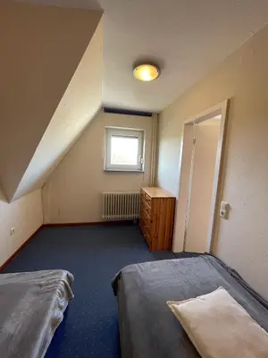 Ein Bett oder Betten in einem Zimmer der Unterkunft 