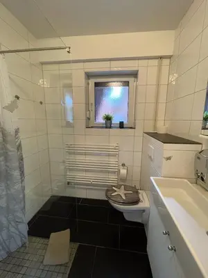 Ein Badezimmer in der Unterkunft 