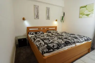 Ein Bett oder Betten in einem Zimmer der Unterkunft Gleich hinterm Deich 2