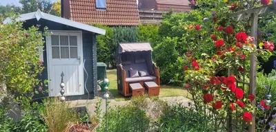 Ein Garten an der Unterkunft Büsumhaus Birgit