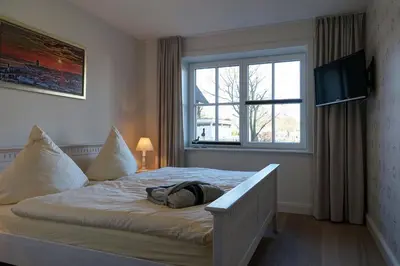 Ein Bett oder Betten in einem Zimmer der Unterkunft Büsumer Reethus 1.8