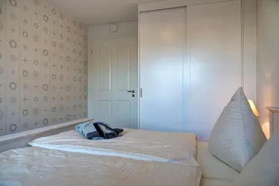 Ein Bett oder Betten in einem Zimmer der Unterkunft Büsumer Reethus 1.8