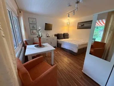 Ein Bett oder Betten in einem Zimmer der Unterkunft Haus Kehrwieder Datscha Gartenhaus