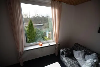 Ein Bett oder Betten in einem Zimmer der Unterkunft Haus Kehrwieder Wohnung Neuwerk