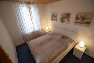 Ein Bett oder Betten in einem Zimmer der Unterkunft Haus Kehrwieder Wohnung Neuwerk