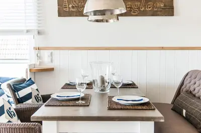 Ein Sitzbereich in der Unterkunft Haus Deichkieker Apartment 3 1 Strandsegler