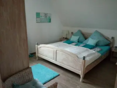 Ein Bett oder Betten in einem Zimmer der Unterkunft Nordseewind