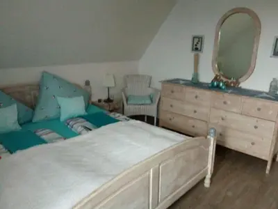 Ein Bett oder Betten in einem Zimmer der Unterkunft Nordseewind