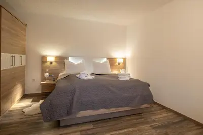 Ein Bett oder Betten in einem Zimmer der Unterkunft Ferienwohnung Glück & Seelig
