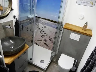 Ein Badezimmer in der Unterkunft Ferienwohnung Deichbude 13 im Hochhaus
