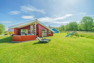 Ein Kinderspielbereich in der Unterkunft Ferienhaus Kum Weer