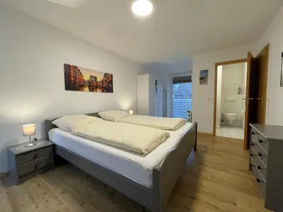 Ein Bett oder Betten in einem Zimmer der Unterkunft Haus Seemeile