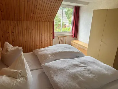 Ein Bett oder Betten in einem Zimmer der Unterkunft Gasthaus zur Grenze