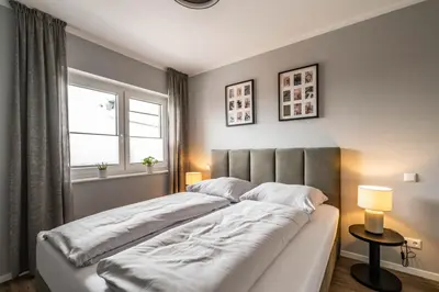 Ein Bett oder Betten in einem Zimmer der Unterkunft Haus Sturmkieker Apartment Penthouse 1 2