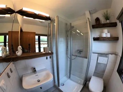 Ein Badezimmer in der Unterkunft 4 Personen Ferienhaus mit Kaminofen und Kanu in Otterndorf