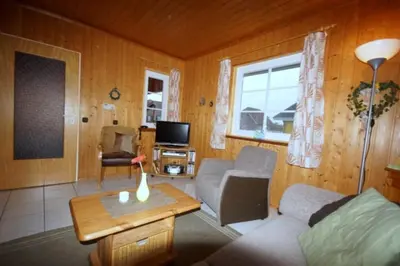 TV/Unterhaltungsangebot in der Unterkunft 4 Personen Ferienhaus mit Carport in Otterndorf