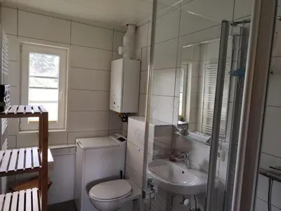 Ein Badezimmer in der Unterkunft 4 Personen Ferienhaus mit Carport in Otterndorf
