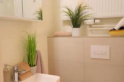 Ein Badezimmer in der Unterkunft Sinfonia