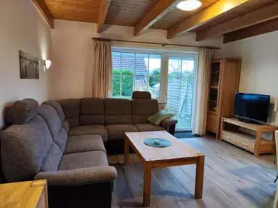 Ein Sitzbereich in der Unterkunft 4 Personen Ferienhaus mit zwei Toiletten in Otterndorf