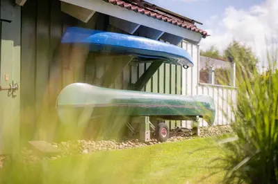 Der Swimmingpool an oder in der Nähe von 4 Personen Luxusferienhaus mit Sauna, Kaminofen, Klimaanlage, Kanu und Seeblick in Otterndorf