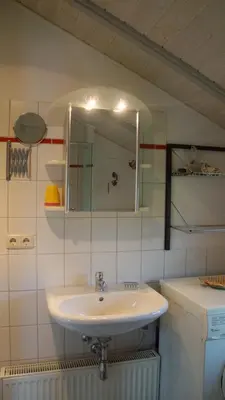 Ein Badezimmer in der Unterkunft 4 Personen Ferienhaus mit Sauna und herrlichem Blick auf den See in Otterndorf