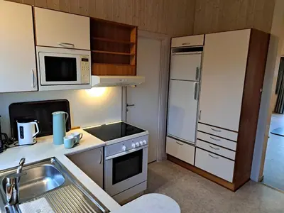Küche/Küchenzeile in der Unterkunft 6 Personen Ferienhaus mit Sauna, Whirlpool, Kaminofen und Kanu in 2. Rheie zum See in Otterndorf