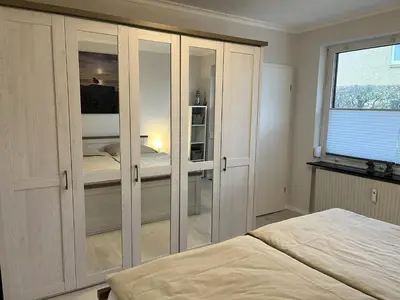 Ein Bett oder Betten in einem Zimmer der Unterkunft MeeresZeit