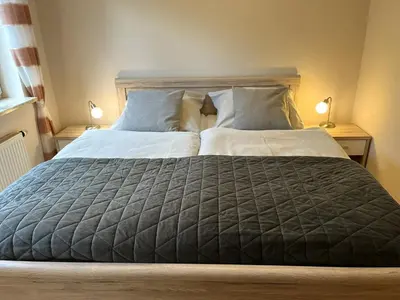 Ein Bett oder Betten in einem Zimmer der Unterkunft Kleine Freiheit