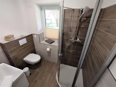 Ein Badezimmer in der Unterkunft Whg Herzenszeit