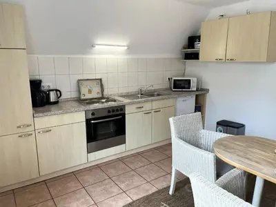 Küche/Küchenzeile in der Unterkunft Wohnung Alkersum
