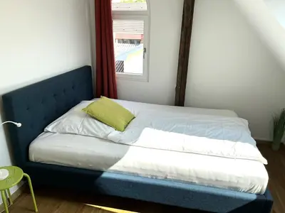 Ein Bett oder Betten in einem Zimmer der Unterkunft Deck 2
