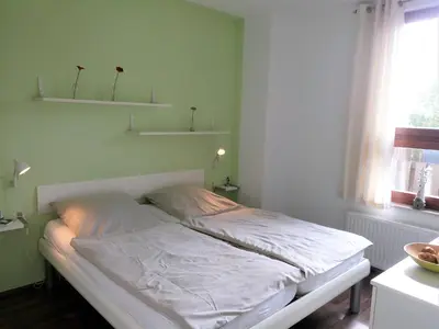 Ein Bett oder Betten in einem Zimmer der Unterkunft Wohnung List