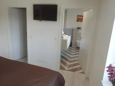 Ein Bett oder Betten in einem Zimmer der Unterkunft Royalsegel