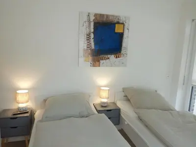 Ein Bett oder Betten in einem Zimmer der Unterkunft Genua
