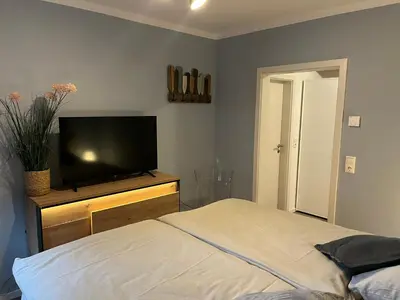 Ein Bett oder Betten in einem Zimmer der Unterkunft Spinnaker