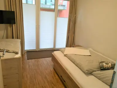 Ein Bett oder Betten in einem Zimmer der Unterkunft Lenia 2