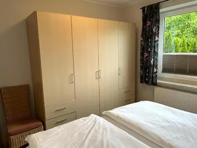 Ein Bett oder Betten in einem Zimmer der Unterkunft Whg 6