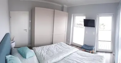 Ein Bett oder Betten in einem Zimmer der Unterkunft Penthouse meertied