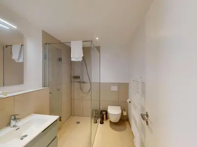 Ein Badezimmer in der Unterkunft Lighthouse Duhner Spitze - W03