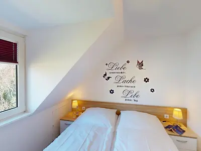 Ein Bett oder Betten in einem Zimmer der Unterkunft Gorch Fock - 11